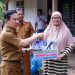 Pj Bupati Pringsewu Salurkan Bantuan untuk Korban Terjangan Angin Kencang
