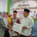 Wakil Bupati Pringsewu Buka Puasa Bersama Warga, Serahkan Bantuan Sosial