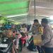 Kapolres Lampung Selatan Bagikan Es Krim dan Susu kepada Pemudik Roda Dua di Pelabuhan Bakauheni